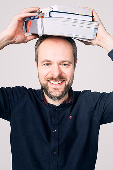 Bilde av Stian som smiler så pent hen kan