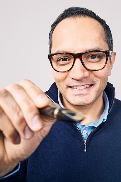 Bilde av Somaiah som smiler så pent hen kan